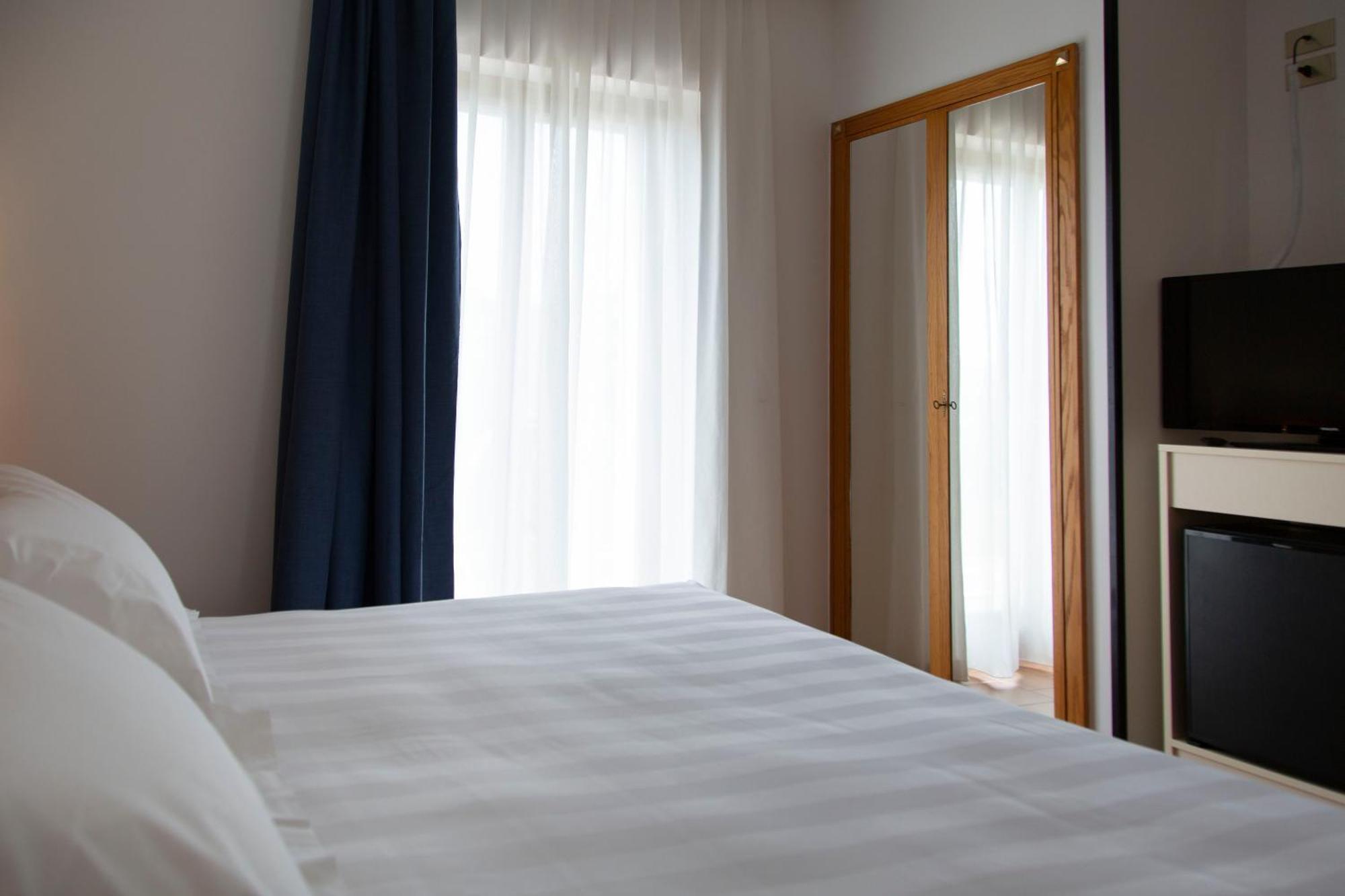 Hotel Villa Paradiso Passignano sul Trasimeno Kamer foto